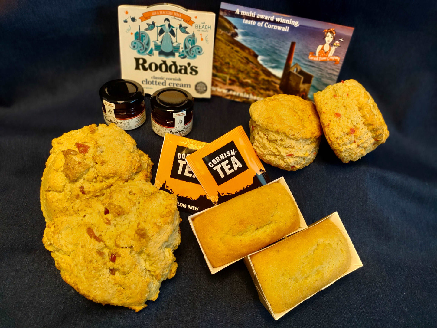 cherry gift box with cherry Bakewell rock buns, mini cherry madeira cakes, and a cherry cream tea delivered to your door.