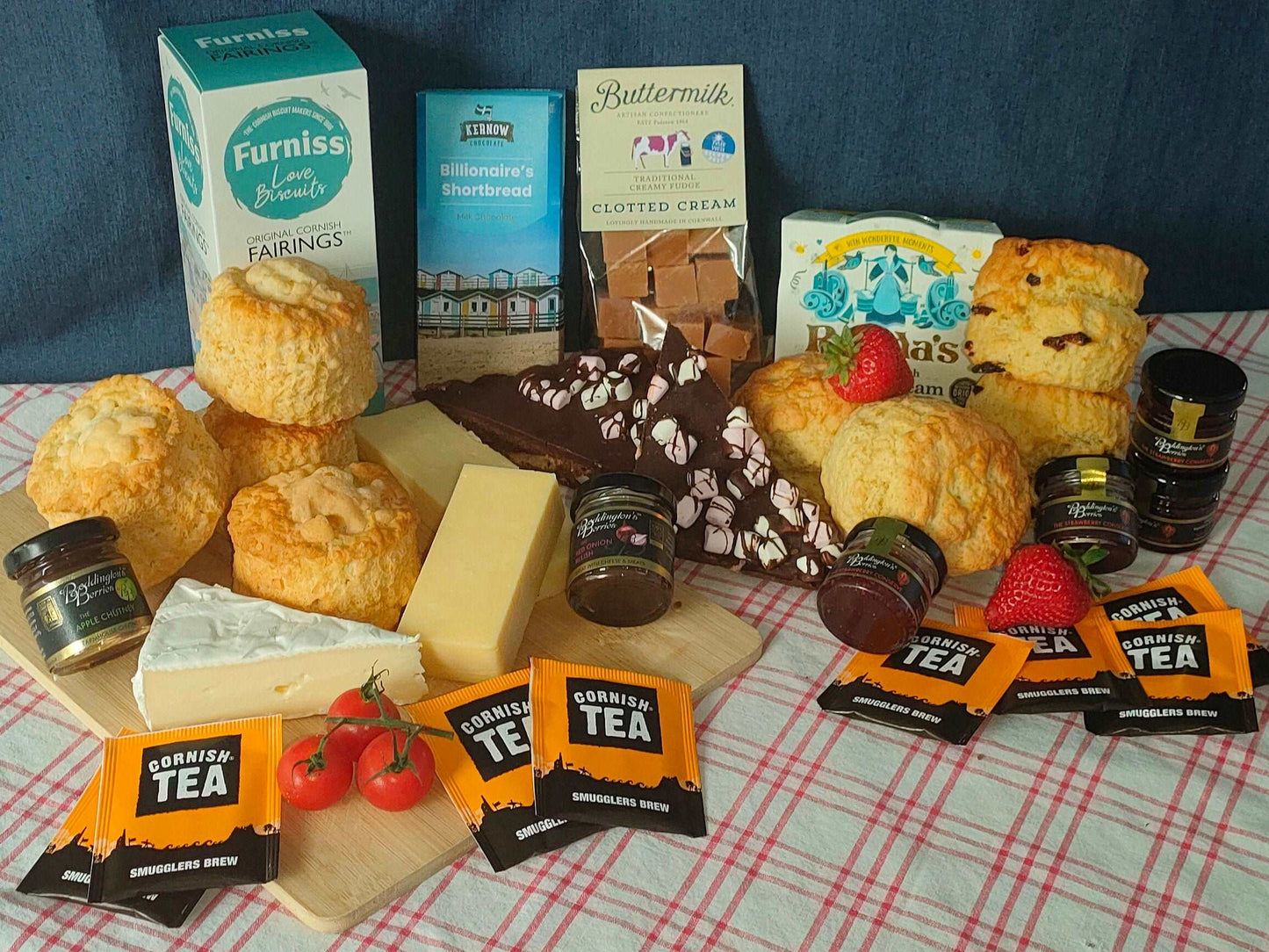 Large Cornish afternoon tea by post - freshly baked sweet and savory scones with the toppings , Rocky road tiffin, shortbread, chocolate and fudge. 