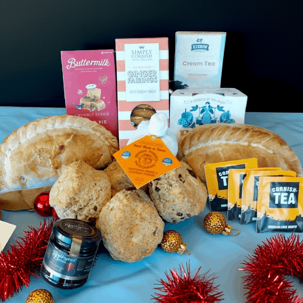 Christmas proper job for two, with our delicious Christmas cream tea, Christmas pasty's cream tea chocolate bar, box of fairings, box of fudge and a Christmas pud.