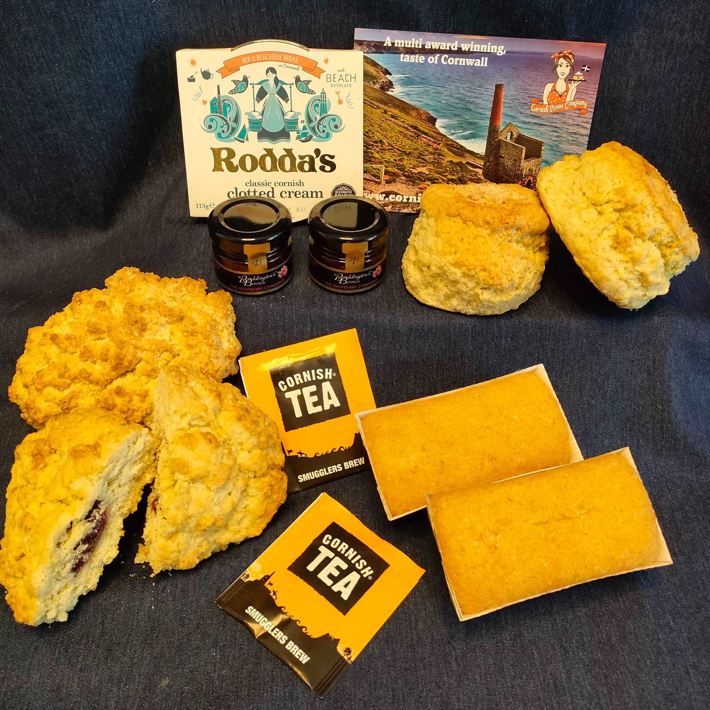 This Yummy Coconut gift box with  coconut and raspberry rock cakes, coconut loaf cakes and  coconut and Raspberry Cornish cream tea by post.